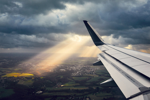 Can I Fly with COVID if I Wear a Mask